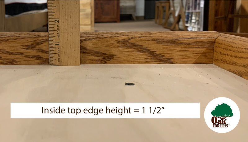 detail picture of a ruler showing the 1 and 1/2 inch inside top edge height from the platform of the OD-O-T456 - Traditional Oak Pedestal Bed - Oak For Less® Furniture