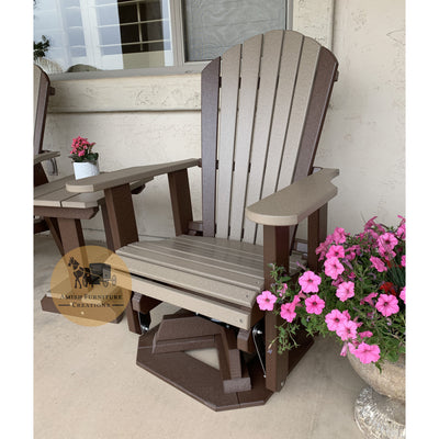 Amish made Outdoor Poly Lumber Adirondack Swivel Glider in tudor brown and weathered wood - pictured next to an end table and flower pot with pink flowers - Oak For Less® Furniture / Amish Furniture Creations™