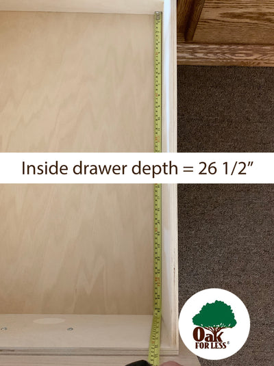 detail picture of a tape measure showing the 26 and 1/2 inch inside depth of a drawer from front to the back of the drawer of the OD-O-T456 - Traditional Oak Pedestal Bed - Oak For Less® Furniture